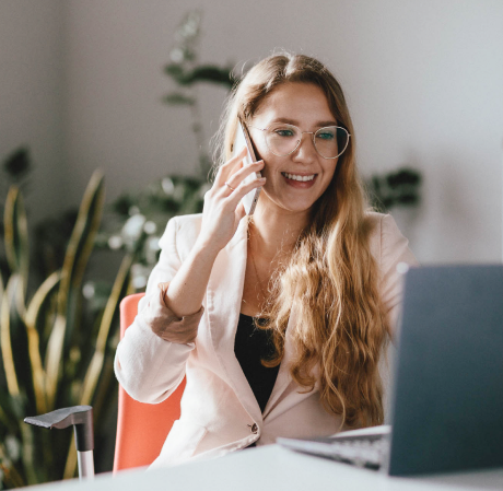 A PragmaGO sales representative talking on the phone with a broker about a partnership